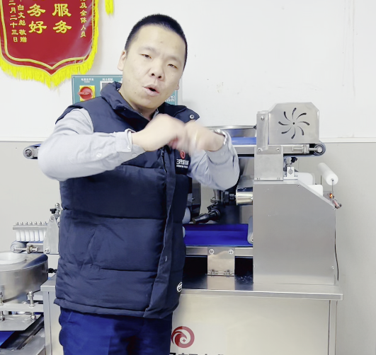 仿手工包子機(jī)工作原理 仿手工包子機(jī)工作原理